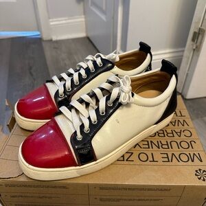 Christian Louboutin Red and Black Sneakers Sleek Design